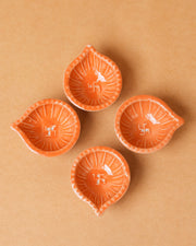 Nurture India Orange Clay Diyas 4-Piece Set