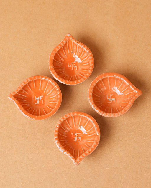 Nurture India Orange Clay Diyas 4-Piece Set
