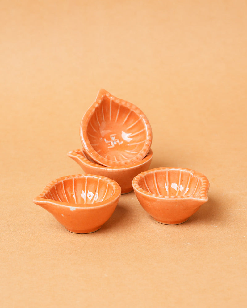 Nurture India Orange Clay Diyas 4-Piece Set