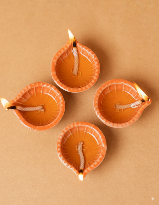 Nurture India Orange Clay Diyas 4-Piece Set
