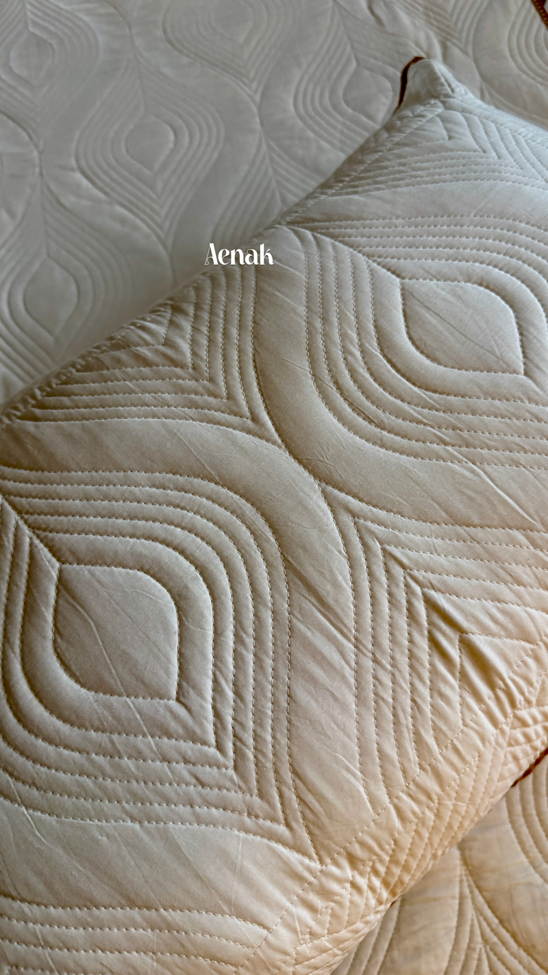 aenak-white-embossed-leaf-quilted-bedcover-with-brown-lace