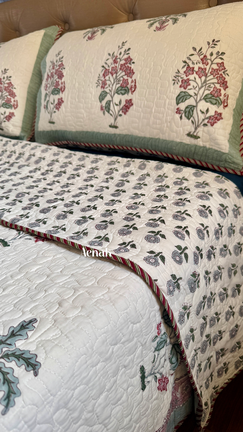 aenak-pink-floral-green-palm-handblock-printed-reversible-quilted-bedcover-set