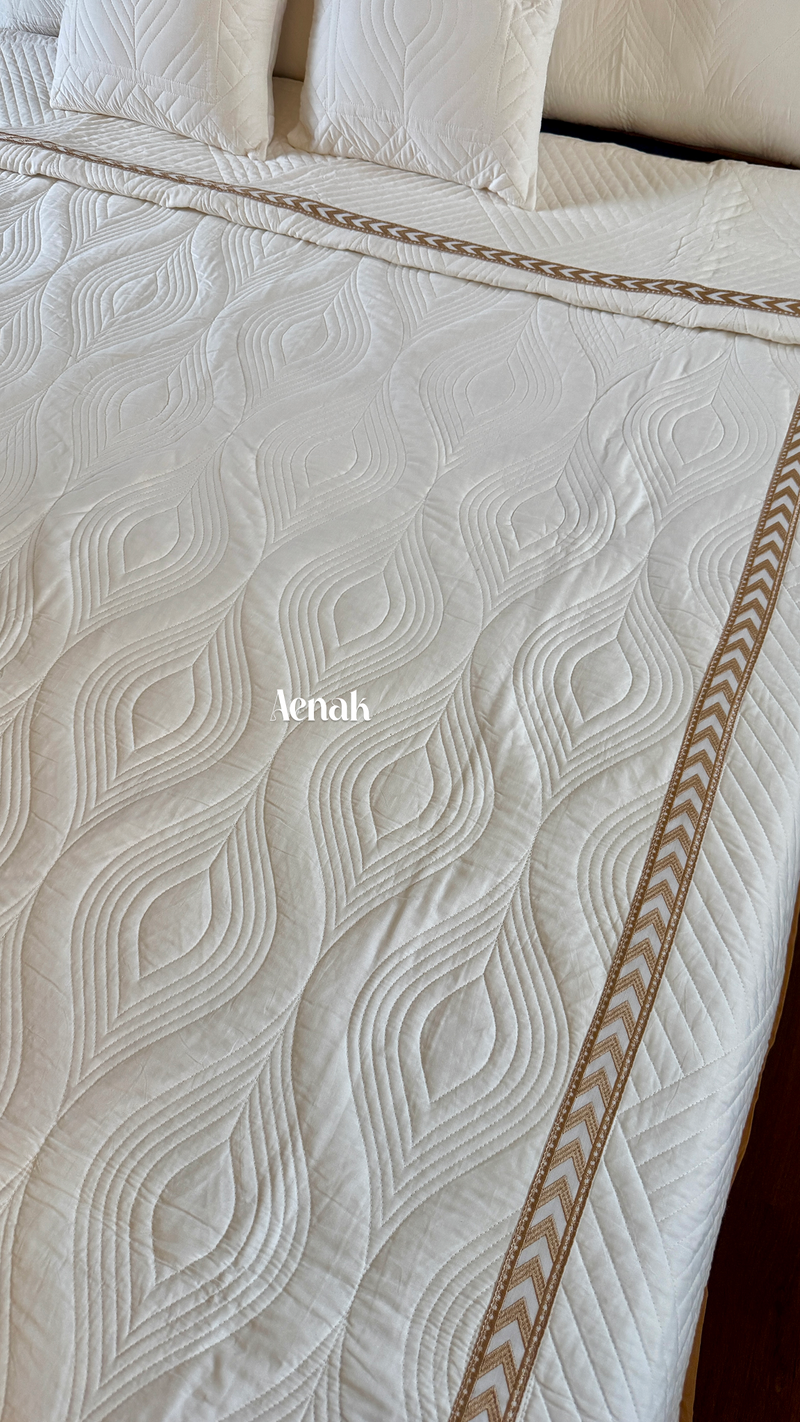 aenak-white-embossed-leaf-quilted-bedcover-with-brown-lace