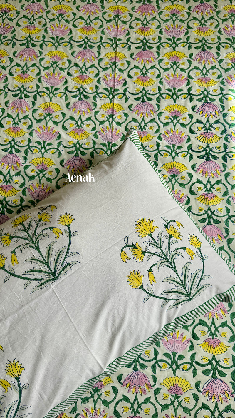 aenak-pink-yellow-lotus-handblock-bedsheet-quilt-combo-set