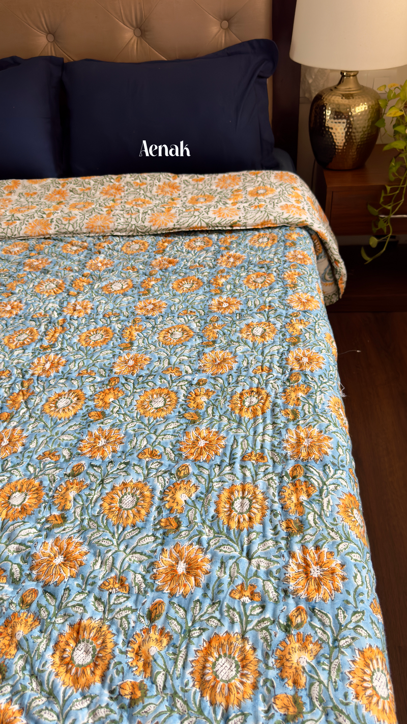 aenak-blue-yellow-floral-garden-handblock-printed-reversible-mulmul-cotton-quilt