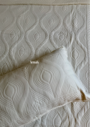 aenak-white-embossed-leaf-quilted-bedcover-with-brown-lace