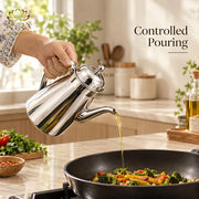 nyra-kitchenware-1-litre-stainless-steel-oil-dispenser-with-glossy-silver-finish-covered-lid-side-handle-and-long-pouring-spout-a-practical-kitchen-essential-for-oil-and-ghee