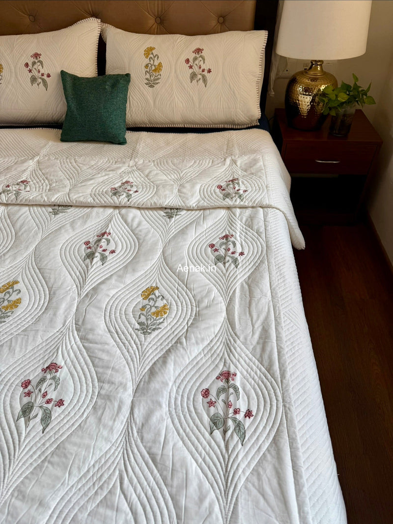aenak-pink-yellow-boota-embossed-quilted-handblock-bedcover-set