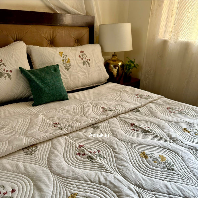aenak-pink-yellow-boota-embossed-quilted-handblock-bedcover-set