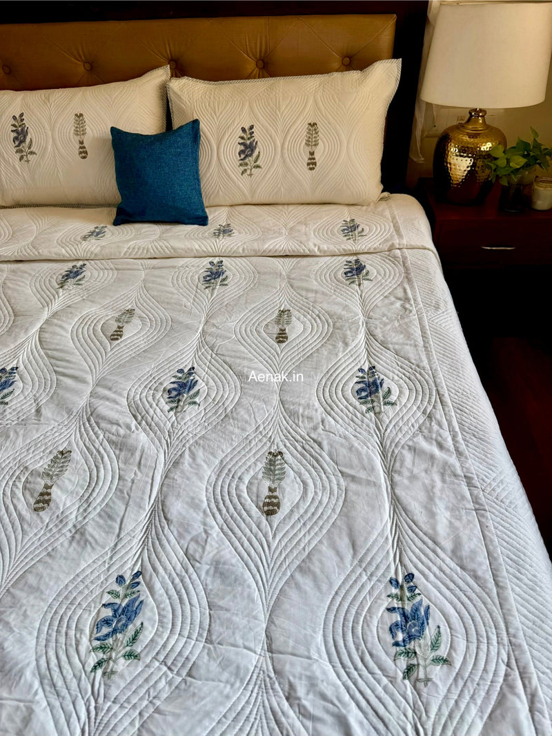aenak-blue-dahlia-embossed-quilted-handblock-bedcover-set
