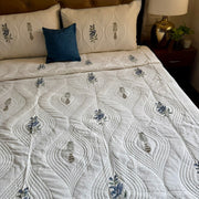 aenak-blue-dahlia-embossed-quilted-handblock-bedcover-set
